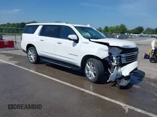 2022 Chevrolet Suburban High Country with VIN 1GNSKGKL3NR313685, listed as a IAAI auction lot 42578190 with 76,974 mi miles and . Bid and sale history available at DreamBid. Image 1.