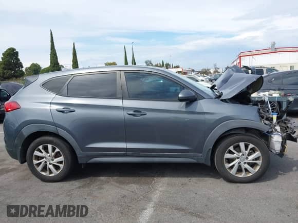 2019 Hyundai Tucson SE z VIN KM8J23A49KU969885, wystawiony jako IAAI lot #43230165 z przebiegiem 165 610 mil mil oraz . Historia ofert i sprzedaży dostępna na DreamBid. Obrazek 13.
