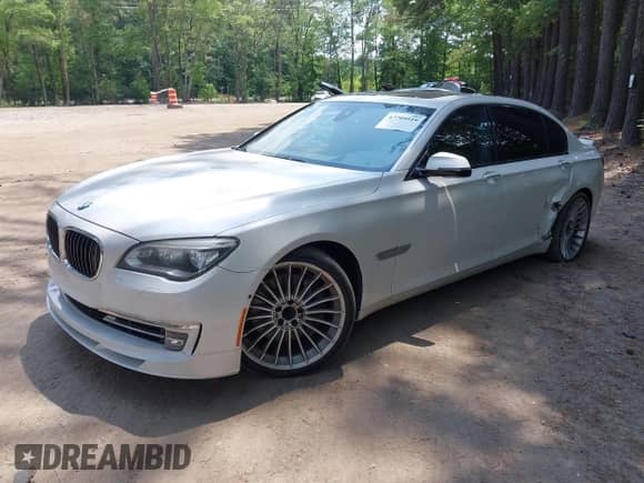 2013 BMW 7 Series 750Li с VIN WBAYE8C55DDS16013, выставлен на аукционе IAAI как лот 42709519 с пробегом 123 405 миль миль и . История ставок и продаж доступна на DreamBid. Изображение 2.