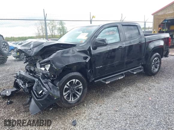 2021 Chevrolet Colorado 4WD Z71 z VIN 1GCGTDEN6M1233477, wystawiony jako IAAI lot #42188303 z przebiegiem 56 638 mil mil oraz . Historia ofert i sprzedaży dostępna na DreamBid. Obrazek 18.