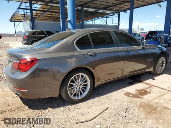 2013 BMW 7 Series 750i with VIN WBAYA8C50DD227660, listed as a Copart auction lot 71820475 with 120,533 mi miles and Salvage title. Bid and sale history available at DreamBid. Image 3.