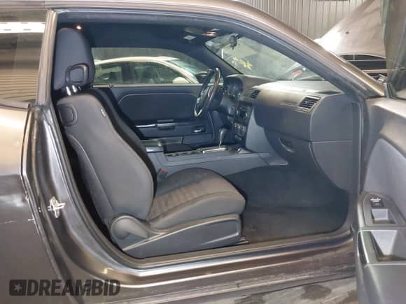 2013 Dodge Challenger SXT с VIN 2C3CDYAG5DH593050, выставлен на аукционе IAAI как лот 43392807 с пробегом 163 707 миль миль и . История ставок и продаж доступна на DreamBid. Изображение 5.