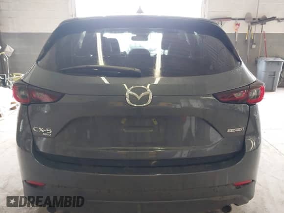 2025 Mazda CX-5 S Carbon Edition z VIN JM3KFBCM2S0623499, wystawiony jako IAAI lot #42865410 z przebiegiem 15 933 mil mil oraz . Historia ofert i sprzedaży dostępna na DreamBid. Obrazek 17.