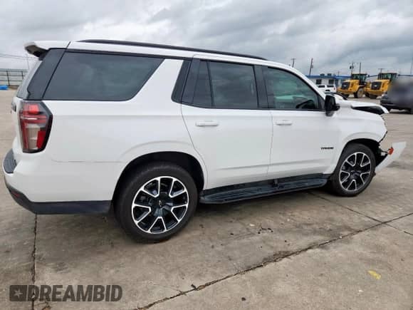 2023 Chevrolet Tahoe RST with VIN 1GNSCRKD3PR297668, listed as a Copart auction lot 60535755 with 39,747 mi miles and Salvage title. Bid and sale history available at DreamBid. Image 3.