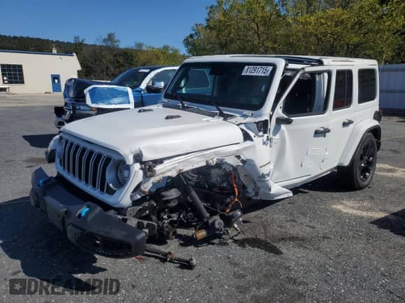 2024 Jeep Wrangler Sahara with VIN 1C4RJXP69RW276890, listed as a Copart auction lot 81291715 with 31,296 mi miles and Salvage title. Bid and sale history available at DreamBid. Image 1.