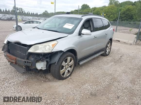 2009 Chevrolet Traverse LTZ with VIN 1GNEV33D69S116223, listed as a IAAI auction lot 43086427 with 172,790 mi miles and . Bid and sale history available at DreamBid. Image 2.