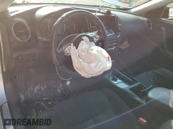 2013 Nissan Maxima S z VIN 1N4AA5AP1DC800343, wystawiony jako Copart lot #70601235 z przebiegiem Nie podano mil oraz Szkoda całkowita • Salvage title. Historia ofert i sprzedaży dostępna na DreamBid. Obrazek 8.