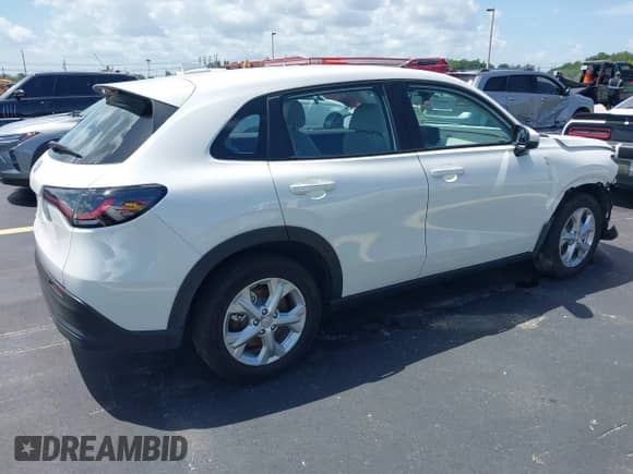 2025 Honda HR-V LX with VIN 3CZRZ1H30SM734164, listed as a IAAI auction lot 43072972 with 3,663 mi miles and . Bid and sale history available at DreamBid. Image 4.