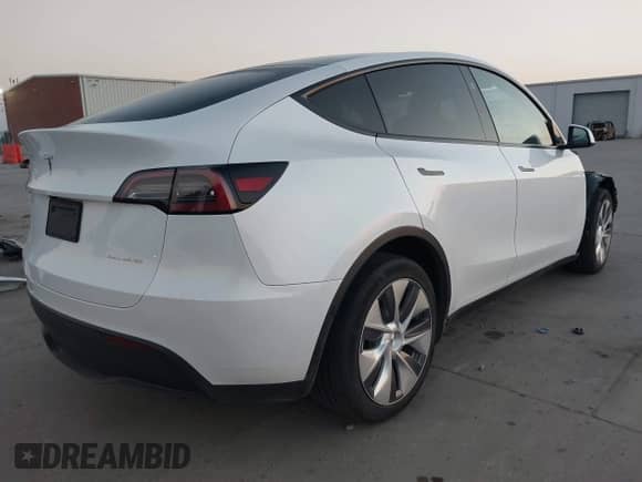2023 Tesla Model Y Long Range with VIN 7SAYGDEE8PA147396, listed as a IAAI auction lot 43437271 with 24,608 mi miles and . Bid and sale history available at DreamBid. Image 4.