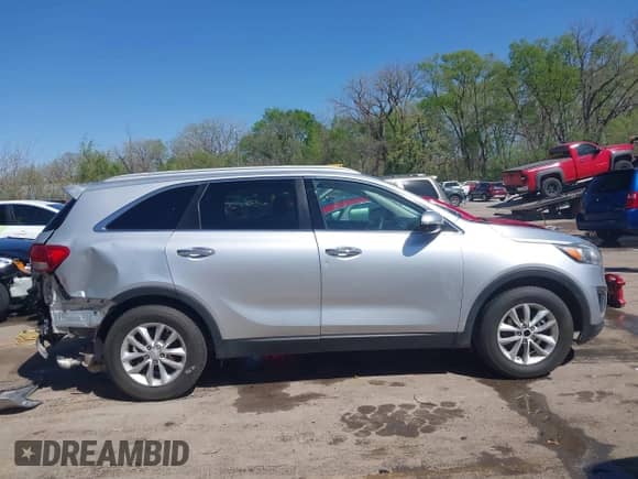 2016 Kia Sorento L with VIN 5XYPG4A3XGG115316, listed as a IAAI auction lot 42024875 with 148,523 mi miles and . Bid and sale history available at DreamBid. Image 14.