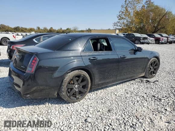 2014 Chrysler 300 SRT-8 with VIN 2C3CCAFJ3EH256845, listed as a Copart auction lot 77766654 with 86,962 mi miles and Salvage title. Bid and sale history available at DreamBid. Image 3.