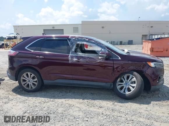 2019 Ford Edge Titanium with VIN 2FMPK3K93KBB40174, listed as a IAAI auction lot 43061291 with 198,000 mi miles and . Bid and sale history available at DreamBid. Image 13.