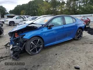 2018 Toyota Camry XSE z VIN 4T1B61HK0JU147072, wystawiony jako Copart lot #85647715 z przebiegiem Nie podano mil oraz Szkoda całkowita • Salvage title. Historia ofert i sprzedaży dostępna na DreamBid. Obrazek 1.