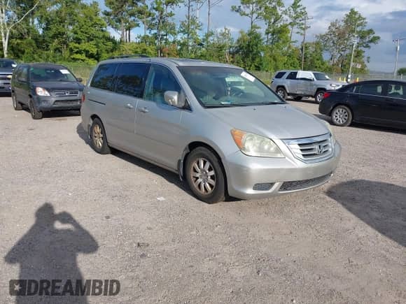2008 Honda Odyssey EX-L with VIN 5FNRL38608B104137, listed as a IAAI auction lot 43284315 with 235,377 mi miles and . Bid and sale history available at DreamBid. Image 1.