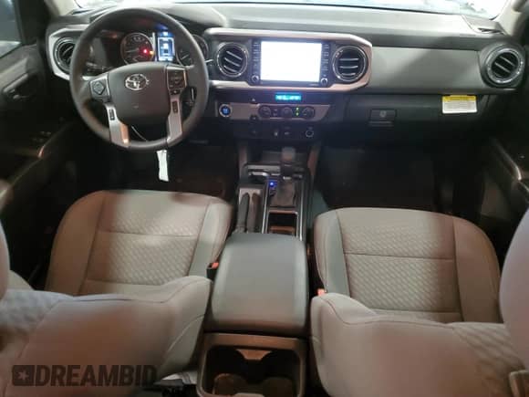 2023 Toyota Tacoma SR5 with VIN 3TYAZ5CN2PT042244, listed as a Copart auction lot 76022534 with 9,551 mi miles and Salvage title. Bid and sale history available at DreamBid. Image 8.