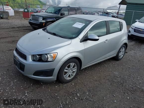 2012 Chevrolet Sonic LS with VIN 1G1JB6SH2C4114902, listed as a IAAI auction lot 42166155 with 140,977 mi miles and . Bid and sale history available at DreamBid. Image 2.