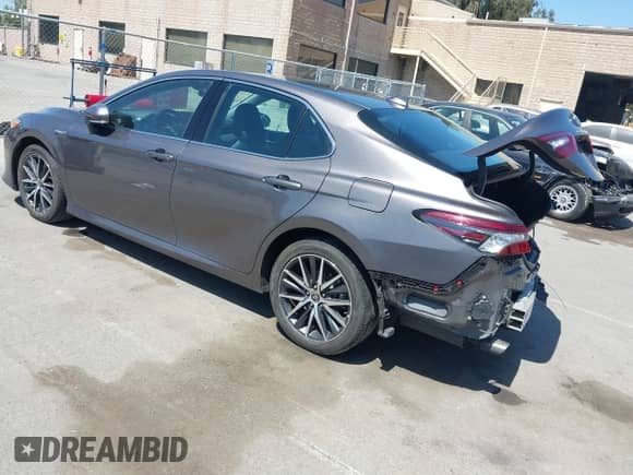 2021 Toyota Camry Hybrid XLE with VIN 4T1F31AK9MU560049, listed as a IAAI auction lot 42211169 with 182,185 mi miles and . Bid and sale history available at DreamBid. Image 3.
