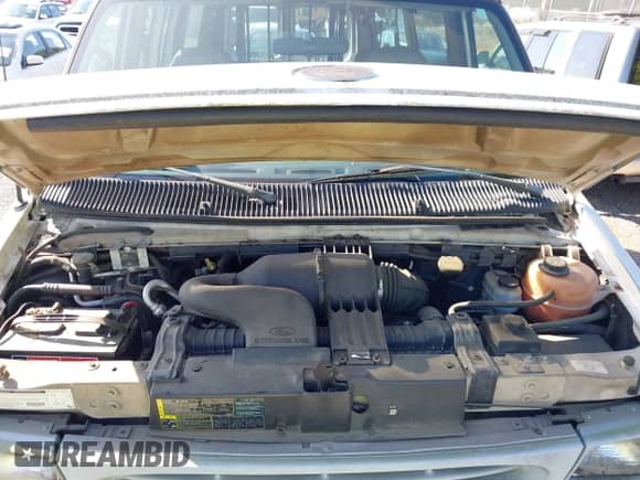 2002 Ford Econoline Cargo with VIN 1FTNE242X2HA90857, listed as a IAAI auction lot 42716391 with 103,796 mi miles and . Bid and sale history available at DreamBid. Image 10.