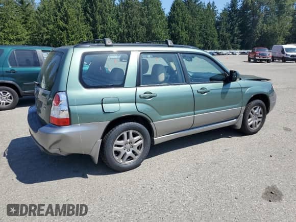 2007 Subaru Forester X L.L. Bean with VIN JF1SG676X7H747088, listed as a Copart auction lot 62539065 with 125,677 mi miles and Salvage title. Bid and sale history available at DreamBid. Image 3.