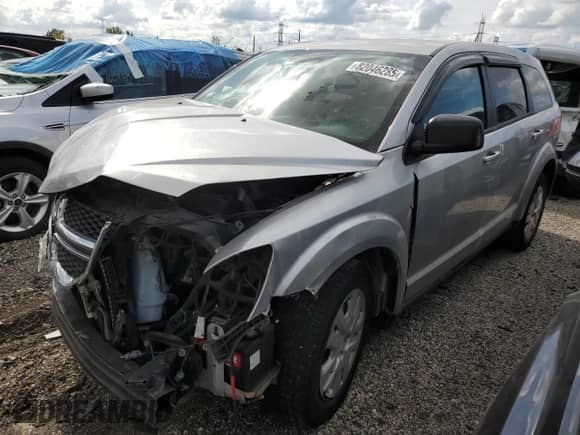 2013 Dodge Journey American Value с VIN 3C4PDCAB5DT701064, выставлен на аукционе Copart как лот 82046285 с пробегом Не указан миль и Списание • Salvage title. История ставок и продаж доступна на DreamBid. Изображение 1.