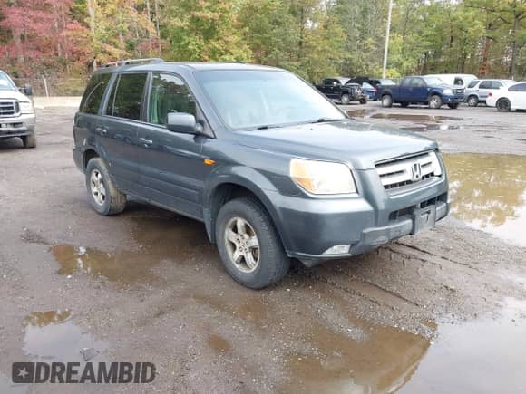 2006 Honda Pilot EX-L with VIN 2HKYF18596H548548, listed as a IAAI auction lot 43457549 with 158,623 mi miles and . Bid and sale history available at DreamBid. Image 1.