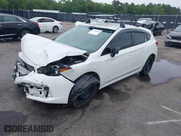 2023 Subaru Impreza with VIN 4S3GTAB6XP3706463, listed as a IAAI auction lot 42201164 with 71,572 mi miles and . Bid and sale history available at DreamBid. Image 17.