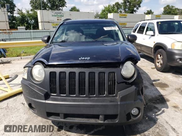 2010 Jeep Compass Sport z VIN 1J4NT1FB0AD659003, wystawiony jako Copart lot #63768104 z przebiegiem 187 670 mil mil oraz Szkoda całkowita • Salvage title. Historia ofert i sprzedaży dostępna na DreamBid. Obrazek 5.