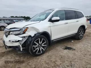 2019 Honda Pilot Touring 8-Passenger z VIN 5FNYF5H91KB018111, wystawiony jako Copart lot #71864465 z przebiegiem 96 937 mil mil oraz Szkoda całkowita • Salvage title. Historia ofert i sprzedaży dostępna na DreamBid. Obrazek 1.