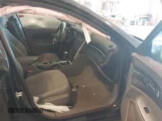 2015 Chevrolet Malibu LS z VIN 1G11B5SL2FF222881, wystawiony jako IAAI lot #43165761 z przebiegiem 153 484 mil mil oraz . Historia ofert i sprzedaży dostępna na DreamBid. Obrazek 5.