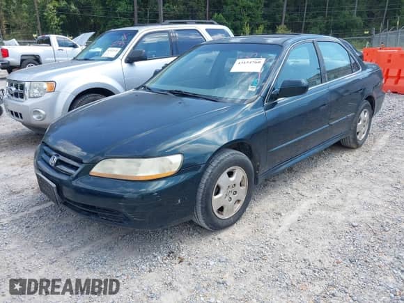 2001 Honda Accord EX z VIN 1HGCG16501A073822, wystawiony jako IAAI lot #43154760 z przebiegiem 181 353 mil mil oraz . Historia ofert i sprzedaży dostępna na DreamBid. Obrazek 6.