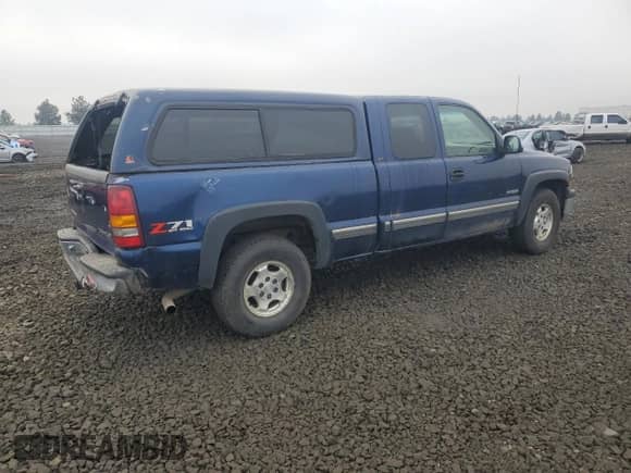 2002 Chevrolet Silverado 1500 LS z VIN 2GCEK19T621134585, wystawiony jako Copart lot #82629095 z przebiegiem 154 674 mil mil oraz Czysty tytuł • Clean title. Historia ofert i sprzedaży dostępna na DreamBid. Obrazek 3.