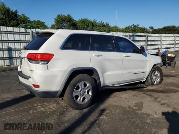 2014 Jeep Grand Cherokee Laredo with VIN 1C4RJEAG7EC433222, listed as a Copart auction lot 82676095 with 83,343 mi miles and Salvage title. Bid and sale history available at DreamBid. Image 3.