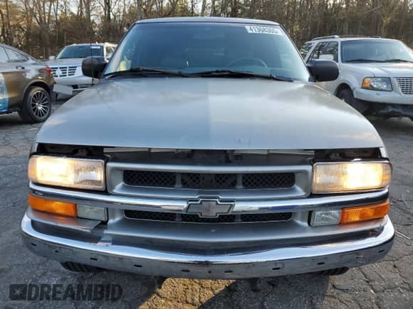 2000 Chevrolet Blazer LS z VIN 1GNCS13W6Y2365299, wystawiony jako Copart lot #41368365 z przebiegiem 144 294 mil mil oraz Szkoda całkowita • Salvage title. Historia ofert i sprzedaży dostępna na DreamBid. Obrazek 5.