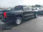 2025 Chevrolet Colorado 2WD Work Truck with VIN 1GCPSBEK2S1138859, listed as a IAAI auction lot 43092596 with 1,807 mi miles and . Bid and sale history available at DreamBid. Image 4.