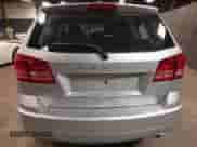 2013 Dodge Journey SE z VIN 3C4PDCAB7DT646083, wystawiony jako IAAI lot #42353530 z przebiegiem 117 965 mil mil oraz . Historia ofert i sprzedaży dostępna na DreamBid. Obrazek 17.