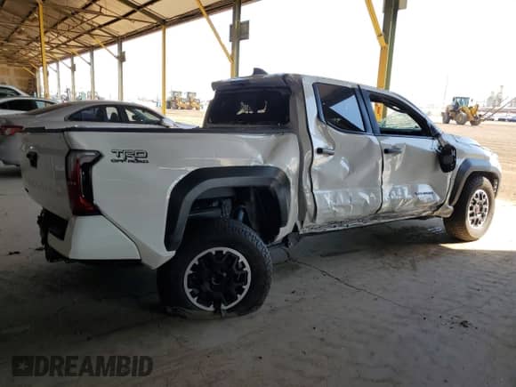 2024 Toyota Tacoma SR5 with VIN 3TYLB5JN1RT001588, listed as a Copart auction lot 72055575 with 21,312 mi miles and Salvage title. Bid and sale history available at DreamBid. Image 3.