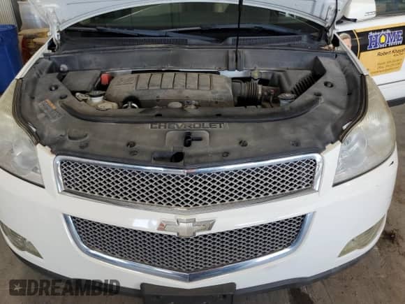 2012 Chevrolet Traverse LTZ с VIN 1GNKRLED4CJ379716, выставлен на аукционе Copart как лот 67741385 с пробегом 145 473 миль миль и Списание • Salvage title. История ставок и продаж доступна на DreamBid. Изображение 12.