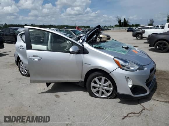 2017 Toyota Prius One z VIN JTDKDTB39H1598651, wystawiony jako Copart lot #70602464 z przebiegiem Nie podano mil oraz Nie do naprawy • Non repairable. Historia ofert i sprzedaży dostępna na DreamBid. Obrazek 4.