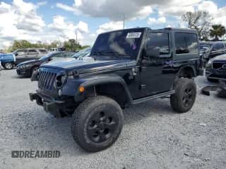 2016 Jeep Wrangler Sport with VIN 1C4AJWAGXGL213448, listed as a Copart auction lot 83864125 with 147,584 mi miles and Salvage title. Bid and sale history available at DreamBid. Image 1.