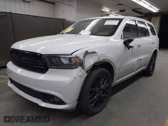 2015 Dodge Durango SXT with VIN 1C4RDJAG4FC202716, listed as a IAAI auction lot 43142717 with 169,362 mi miles and . Bid and sale history available at DreamBid. Image 17.