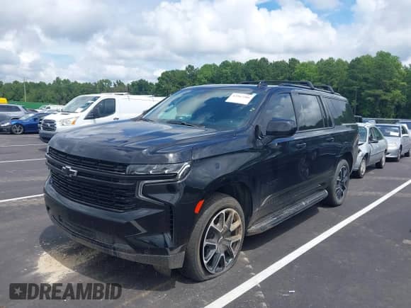 2023 Chevrolet Suburban RST z VIN 1GNSKEKD5PR124911, wystawiony jako IAAI lot #42967206 z przebiegiem 31 941 mil mil oraz . Historia ofert i sprzedaży dostępna na DreamBid. Obrazek 17.