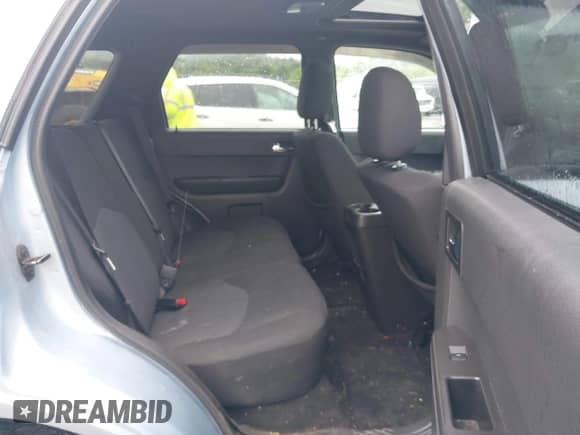 2008 Mercury Mariner with VIN 4M2CU91178KJ12057, listed as a IAAI auction lot 42358190 with 100,000 mi miles and . Bid and sale history available at DreamBid. Image 8.