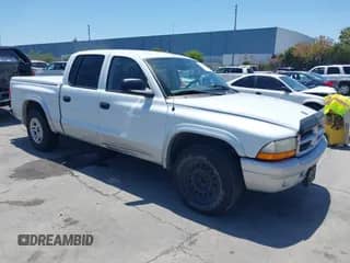 2003 Dodge Dakota SLT with VIN 1D7HL48N03S184534, listed as a IAAI auction lot 42423520 with 197,070 mi miles and . Bid and sale history available at DreamBid. Image 1.