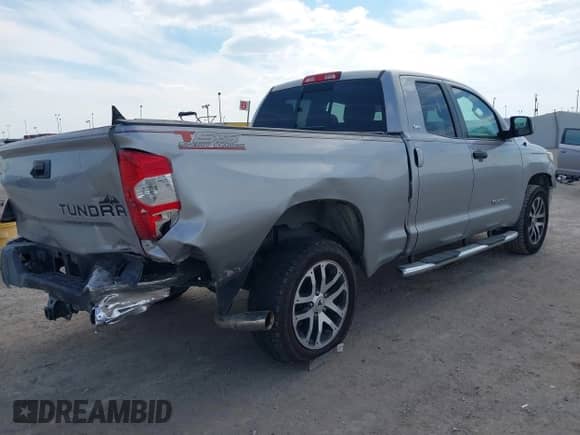 2018 Toyota Tundra SR5 z VIN 5TFRM5F14JX125410, wystawiony jako IAAI lot #43474801 z przebiegiem 177 267 mil mil oraz . Historia ofert i sprzedaży dostępna na DreamBid. Obrazek 6.