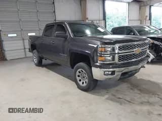 2015 Chevrolet Silverado 1500 LT z VIN 3GCUKREC2FG343805, wystawiony jako IAAI lot #42616309 z przebiegiem 132 827 mil mil oraz . Historia ofert i sprzedaży dostępna na DreamBid. Obrazek 1.