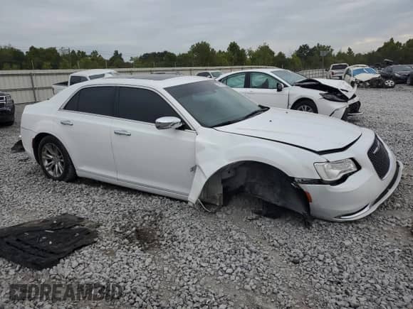 2016 Chrysler 300 C с VIN 2C3CCAEG9GH167497, выставлен на аукционе Copart как лот 70949735 с пробегом 299 306 миль миль и Списание • Salvage title. История ставок и продаж доступна на DreamBid. Изображение 4.