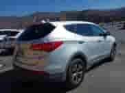 2015 Hyundai Santa Fe with VIN 5XYZT3LB6FG258328, listed as a IAAI auction lot 43419286 with Not provided miles and . Bid and sale history available at DreamBid. Image 4.