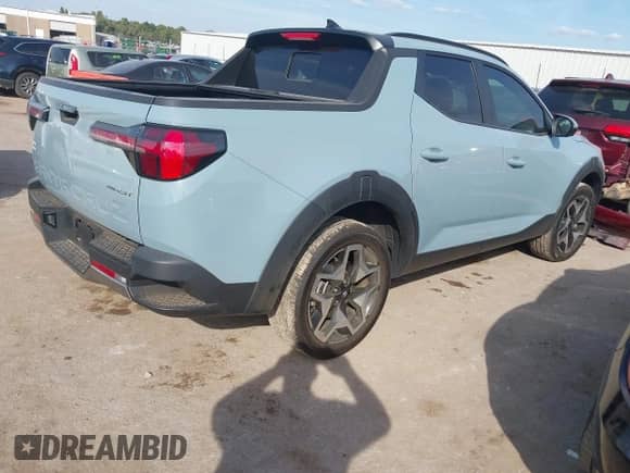 2024 Hyundai Santa Cruz Limited with VIN 5NTJEDAF9RH080030, listed as a IAAI auction lot 43289374 with 10,767 mi miles and . Bid and sale history available at DreamBid. Image 4.