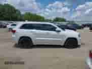2014 Jeep Grand Cherokee SRT-8 z VIN 1C4RJFDJXEC450402, wystawiony jako IAAI lot #42705334 z przebiegiem 67 372 mil mil oraz . Historia ofert i sprzedaży dostępna na DreamBid. Obrazek 13.