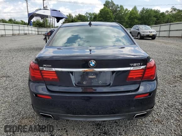 2015 BMW 7 Series 750i xDrive with VIN WBAYB6C58FD966084, listed as a Copart auction lot 61875325 with 159,616 mi miles and Salvage title. Bid and sale history available at DreamBid. Image 6.